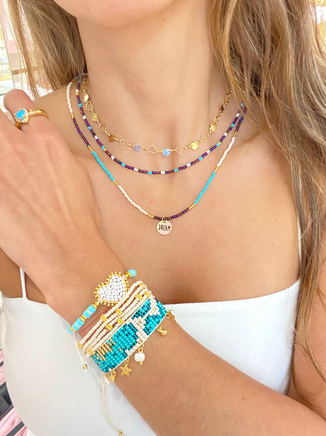 PULSERA TEJIDA CORAZÓN TURQUESA